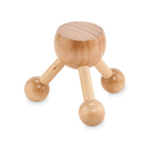 ASSA Hand held massager in wood